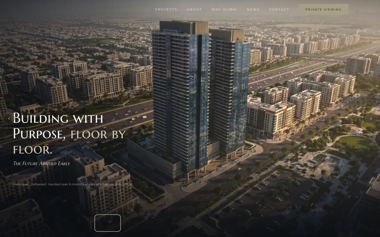 A Dubai property developer homepage on a laptop